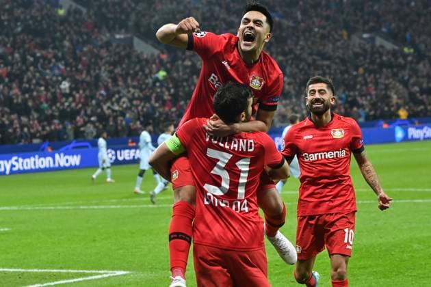 GER, CL, Bayer 04 Leverkusen vs. Atletico Madrid 06 11 2019, BayArena, Leverkusen, GER, CL, Bayer 04 Leverkusen vs. Atletico Madrid, UEFA regulations prohibit any use of photographs as image sequences and or quasi video in picture Kevin Volland 31, Bayer 04 Leverkusen cheers after his goal to 2 0 with Nadim Amiri 11, Bayer 04 Leverkusen Kerem Demirbay 10, Bayer 04 Leverkusen nordphoto Mauelshagen nph00321