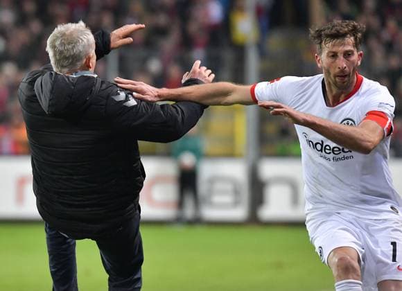 10 11 2019, xblx, Football 1 Bundesliga, SC Freiburg Eintracht Frankfurt emspor, v l Coach Christian Streich SC Freiburg is run over by David Abraham Eintracht Frankfurt, Red card for, red card for, dismissal, Game Misconduct DFL DFB REGULATIONS PROHIBIT ANY USE OF PHOTOGRAPHS as IMAGE SEQUENCES and or QUASI VIDEO Freiburg