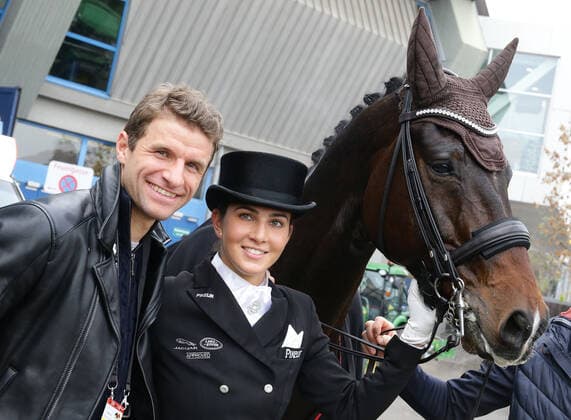 Stuttgart , Riding , Stuttgart German Masters , Dressage , Qualifiaktion zum Grand Prix Special , Winner Lisa Müller with her husband Thomas Müller and horse Gut Wettlkam s Stand by me old