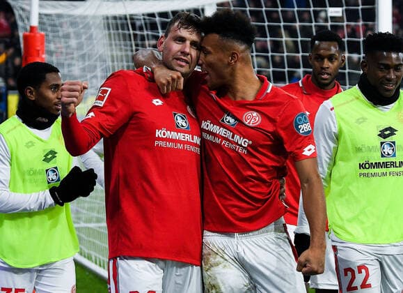 02 12 2019, xpsx, Soccer 1 Bundesliga, 1 FSV Mainz 05 Eintracht Frankfurt v l celebrate the goal, goal celebration to 2 1 for Mainz goal scorer Adam Szalai FSV Mainz 05 , Karim Onisiwo FSV Mainz 05 DFL DFB REGULATIONS PROHIBIT ANY USE OF PHOTOGRAPHS as IMAGE SEQUENCES and or QUASI VIDEO Photo Jan Huebner Scheiber Mainz