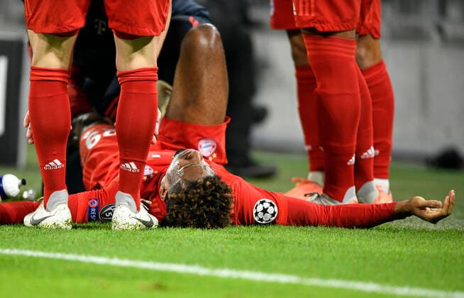 Kingsley Coman FC Bayern Munich injured injury on ground Change, substitution, substitution Champions League CL Group phase FC Bayern Munich FCB vs Tottenham Hotspur Spurs 11 12 2019 DFL REGULATIONS PROHIBIT ANY USE OF PHOTOGRAPHS AS IMAGE SEQUENCES AND OR QUASI VIDEO FC Bayern Munich FCB vs Tottenham Hotspur Spurs