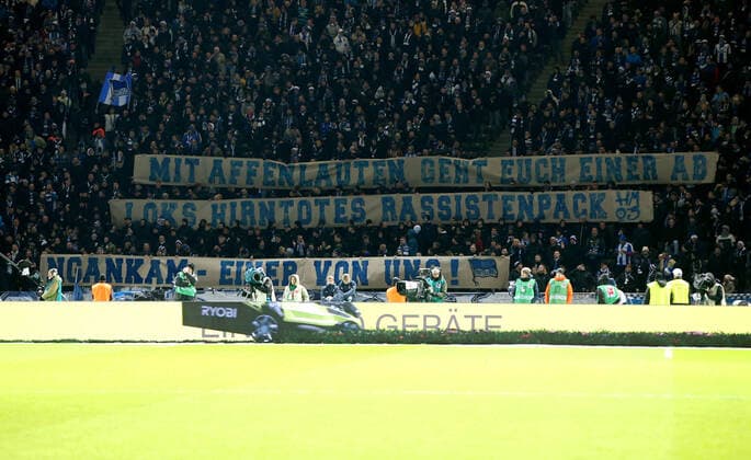 poster banner of the Herthafans east curve against racism because of monkey sounds against Jessic Ngankam sport football football DFL Bundesliga men season 2019 2020 14 12 2019 Hertha BSC Berlin vs SC Freiburg SCF DFL regulations prohibit any use of photographs as image sequences and or quasi video