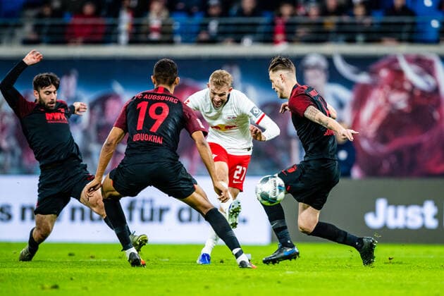 Konrad Laimer 27 RB Leipzig to 1 1 goal, Felix Uduokhai 19 FC Augsburg , Jeffrey Gouweleeuw 6 FC Augsburg during the 2019 2020 season in the 1 Football Bundesliga Men between RB Leipzig and FC Augsburg in the Red Bull Arena on 21 December 2019 in Leipzig, Saxony, Germany DFL REGULATIONS PROHIBIT ANY USE OF PHOTOGRAPHS AS IMAGE SEQUENCES AND OR QUASI VIDEO