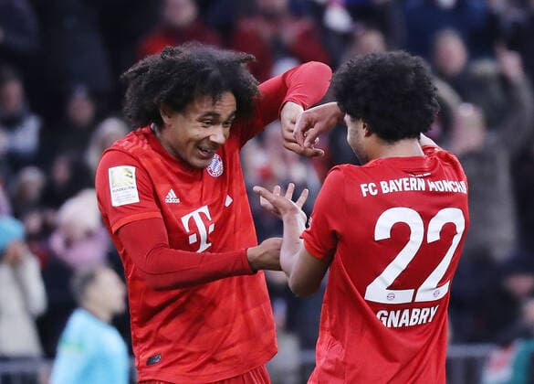 FC Bayern Munich VFL Wolfsburg 2 0 The two goal scorers cheer together, Joshua Zirkzee and Serge Gnabry Munich Bayern Deutschland Allianz Arena