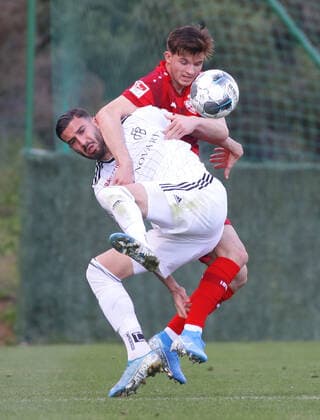 Marbella , football training camp test match , VfB Stuttgart vs FC Basel , from left Kemal Ademi Basel Antonis Aidonis vfB