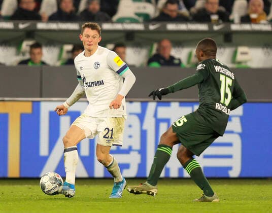 Photo Fabian Reese Schalke against Jerome Roussillon right , Wolfsburg Fussball 1 Bundesliga , on Wed 18 12 2019 VfL Wolfsburg Schalke 04