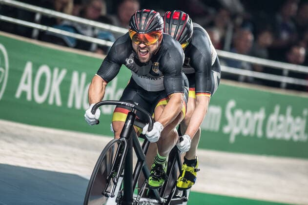 Robert Förstemann GER Berlin with paracyclist Kai Kruse GER Hamburg on the road Landscape horizontal Event Event 108 Berlin Six Day Six Day Berlin 1 Night Wolfram Champions Sprint Men 250 meter time trial flying Location Velodrom Berlin Region Berlin Land Country Germany Date Date 23 01 2020 Stiehl Photography