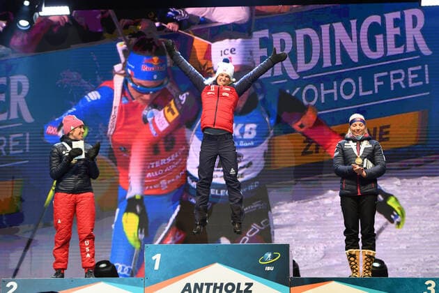 BIATHLON DARKLEE Susan USA , ROEISELAND Marte Olsbu NOR and CHARVATOVA Lucie CZE at the award ceremony of the World Championship Biathlon Antholz Womens Sprint on 14 02 2020, Italy, South Tyrol Antholz Anterselva Medal Plaza South Tyrol Italy