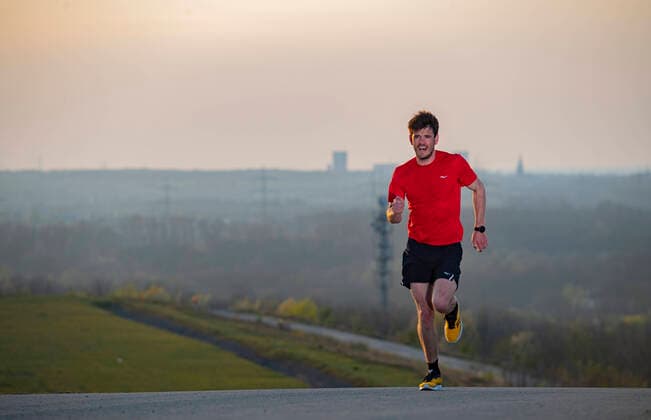 Professional triathlete Patrick Dirksmeier at the mountain running training on the Halde Hoheward between Herten and Recklinghausen in NRW on 07 04 2020 Patrick Dirksmeier runs up the Halde, Copyright: xChristopherxNeundorf Kirchner-Mediax