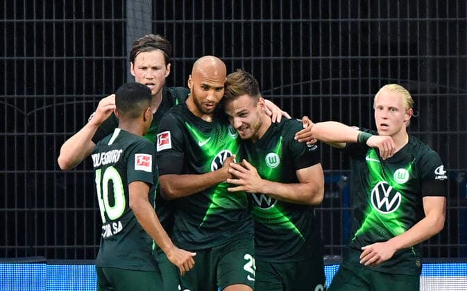 Bayer 04 Leverkusen VfL Wolfsburg, 26 05 2020 Soccer, 1 Bundesliga, Season 19 20, 28 Matchday, Bayer 04 Leverkusen VfL Wolfsburg, 26 05 2020 Goal celebration Wout Weghorst Wolfsburg , Anthony Brooks Wolfsburg , Marin Pongracic Wolfsburg , Xaver Schlager Wolfsburg Photo Ulrich Hufnagel Hufnagel PR Pool Only for journalistic purposes Only for editorial use According to the regulations of the DFL German Soccer League it is prohibited, to use or have used photographs taken in the stadium and or of the match in the form of sequence images and or video-like photo sequences DFL regulations prohibit any use of photographs as image sequences and or quasi video Leverkusen Bayarena NRW Germany Poolfoto Ulrich Hufnagel Hufnagel PR Pool ,EDITORIAL USE ONLY
