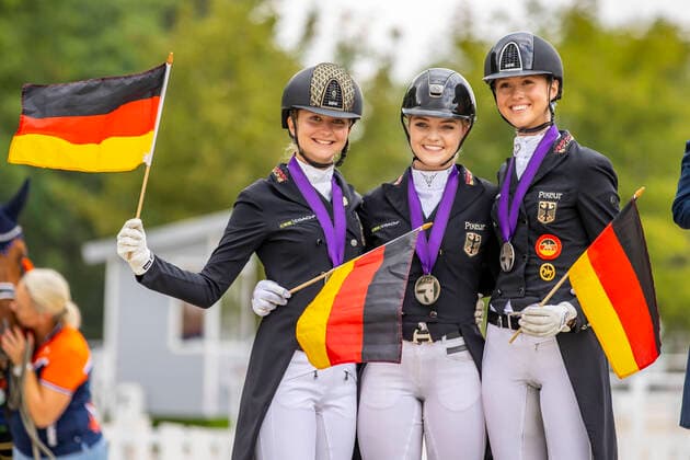 Pilisjaszfalu FEI Youth Dressage EUROPEAN CHAMPIONSHIPS 2020, Team Germany SCHMIDT Henriette GER , Rocky s Sunshine, COLLIN Luca Sophia GER , Descolari, WELSCHOF Lia GER , First class award ceremony Young Riders Team Competition Part 2 Pilisjaszfalu FEI Youth Dressage EUROPEAN CHAMPIONSHIPS 2020 18 August 2020