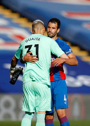 12th September 2020; Selhurst Park, London, England; English Premier League Football, Crystal Palace versus Southampton; Luka Milivojevic of Crystal Palace hugs Goalkeeper Vicente Guaita of Crystal Palace after full time  ActionPlus12233858 JohnxPatrickxFletcher Content restricted for UK based newspaper