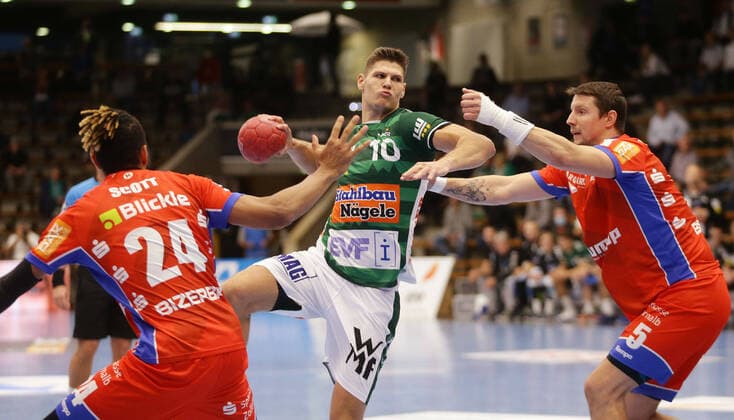 Göppingen , LIQUI MOLY HBL , Handball Bundesliga , Frisch Auf Göppingen vs HBW Balingen Weilstetten , from left James Scott Bali Sebastian Heymann Göppi Romas Kirveliavicius Bali