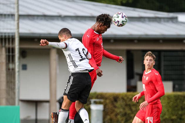 Football match Germany U20 vs. Switzerland U20 07 10 2020 Can Bozdogan Germany U20 18 and Noel Wetz Switzerland U20 19 in a header duel ,Football match, Germany U20 vs. Switzerland U20, on Wednesday, 07 October 2020 Sportanlage Grütt in Lörrach Germany Copyright: xBEAUTIFULxSPORTS G.xHubbsx