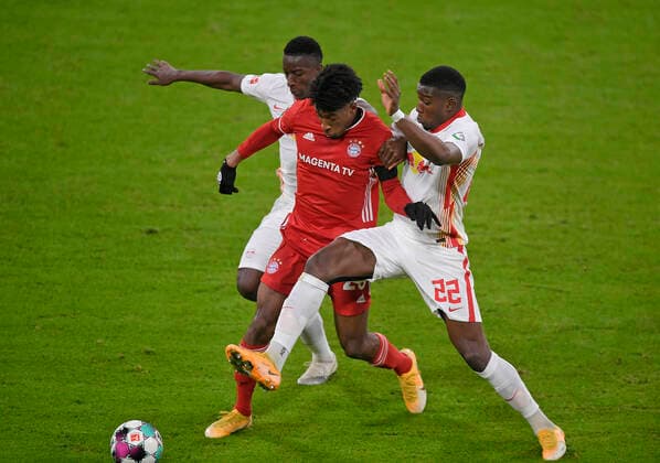 05 12 2020, Football 1 Bundesliga FC Bayern RB Leipzig 05 12 2020, Football 1 Bundesliga 2020 2021, 10 matchday, FC Bayern München RB Leipzig, in the Allianz Arena Munich L R Amadou Heidara RB Leipzig against Kingsley Coman Bayern München and Nordi Mukiele RB Leipzig Photo Bernd Feil M i S Pool Only for journalistic purposes Only for editorial use According to the regulations of the DFL Deutsche Fußball Liga it is prohibited to use or have used photographs taken in the stadium and or of the match in the form of sequence images and or video-like photo sequences DFL regulations prohibit any use of photographs as image sequences and or quasi video National and international NewsAgencies OUT Munich Allianz Arena Bayern Deutschland Poolfoto ,EDITORIAL USE ONLY