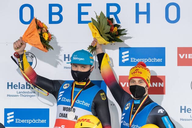 Toni Eggert GER, Germany with Sascha Benecken GER, Germany winner, first place, gold medal, gold medal cheers, celebration award ceremony, Award Ceremony, 12 12 2020, Oberhof Germany , Eberspaecher Luge World Cup Oberhof xprx