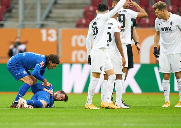 Football 1 German Soccer League FC AUGSBURG FC SCHALKE 04 Alessandro SCHÖPF, S04 28 heavy injury in the match FC AUGSBURG FC SCHALKE 04 1 German Football League , Augsburg, Germany, December 13, 2020 Season 2020 2021, matchday 11, 1 Bundesliga Photographer Peter Schatz Pool National and international News Agencies OUT Editorial Use ONLY DFL REGULATIONS PROHIBIT ANY USE OF PHOTOGRAPHS as IMAGE SEQUENCES and or QUASI VIDEO Augsburg WWK Arena Bavaria Germany Poolfoto Peter Schatz Pool ,EDITORIAL USE ONLY