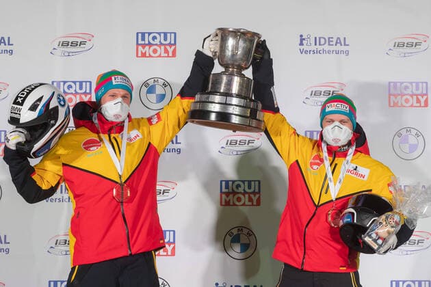 from left Alexander Schueller, Francesco Friedrich GER, Germany Winner, First Place, Gold Medal, gold medal Award Ceremony Celebration, 2 7 2021, Altenberg Germany , IBSF World Championships Bobsleigh and Skeleton Altenberg xprx