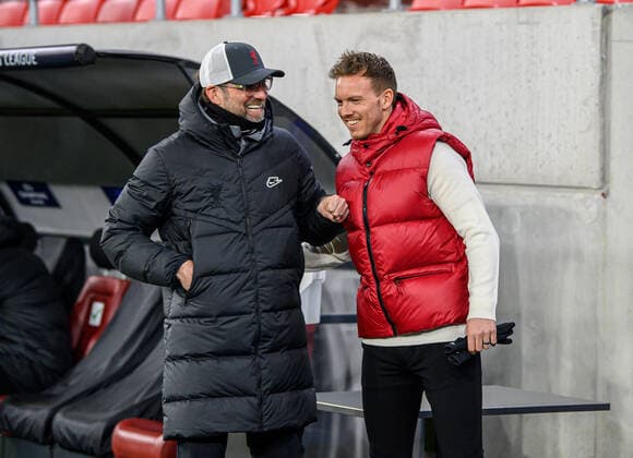 Liverpool coach Juergen Klopp and Leipzig coach Julian Nagelsmann stand together and talk UEFA Champions League Round of 16, second leg FC Liverpool RB Leipzig 2 0 10 03 2021, Puskas Arena in Budapest Hungary FC Liverpool RB Leipzig
