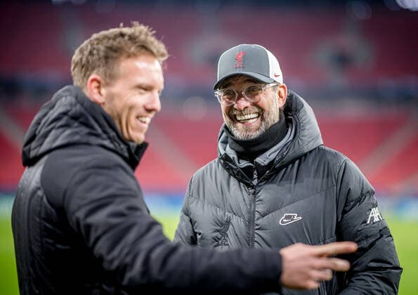 Liverpool coach Juergen Klopp and Leipzig coach Julian Nagelsmann stand together and talk UEFA Champions League Round of 16, second leg FC Liverpool RB Leipzig 2 0 10 03 2021, Puskas Arena in Budapest Hungary FC Liverpool RB Leipzig