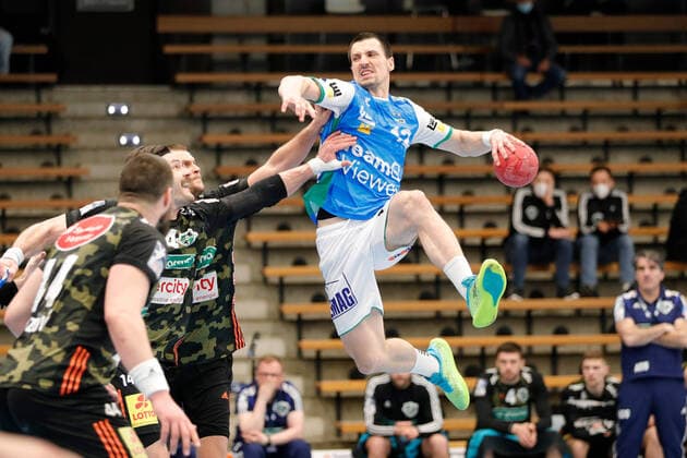 Göppingen , LIQUI MOLY HBL , Handball Bundesliga , Frisch Auf Göppingen vs TSV Hannover Burgdorf, from left Ilija Brozovic and Fabian Böhm Han Nemanja Zelenovic Göppi