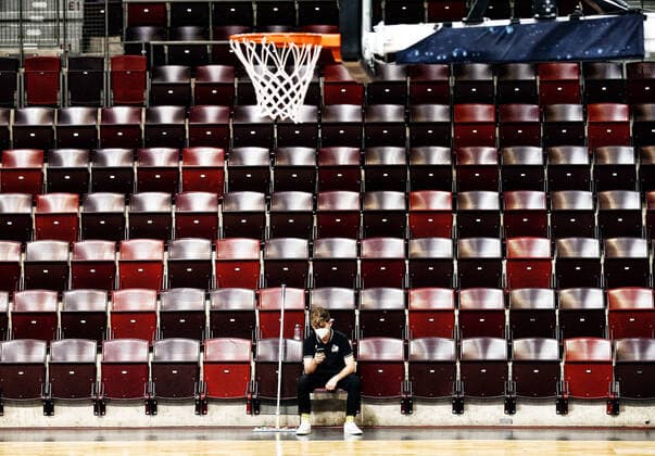 A helper sits in a spectator seat during the game MHP Riesen Ludwigsburg vs Mitteldeutscher BC Basketball Bundesliga 2020 2021 Ludwigsburg , GER, 01 04 2021,