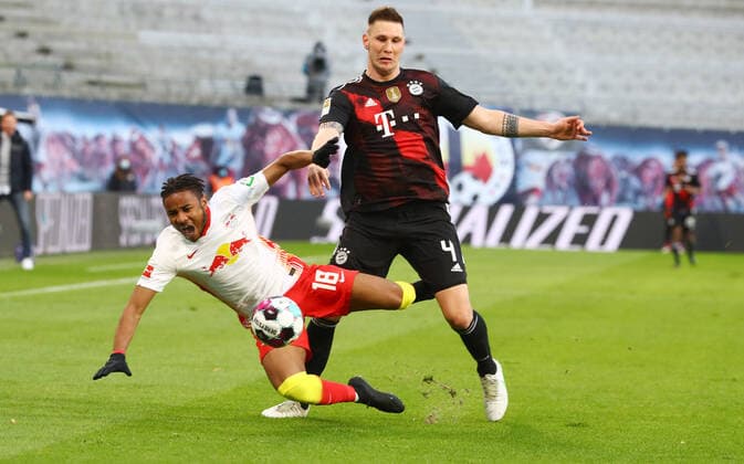 RB Leipzig FC Bayern 03 04 2021 Leipzig, 03 04 2021, Red Bull Arena, Football, Bundesliga, 27 Spieltag , RB Leipzig vs FC Bayern Munich , Im Bild v l Christopher Nkunku 18, RB Leipzig , Niklas Süle Suele 4, Bayern , DFL regulations prohibit any use of photographs as image sequences and or quasi video ,