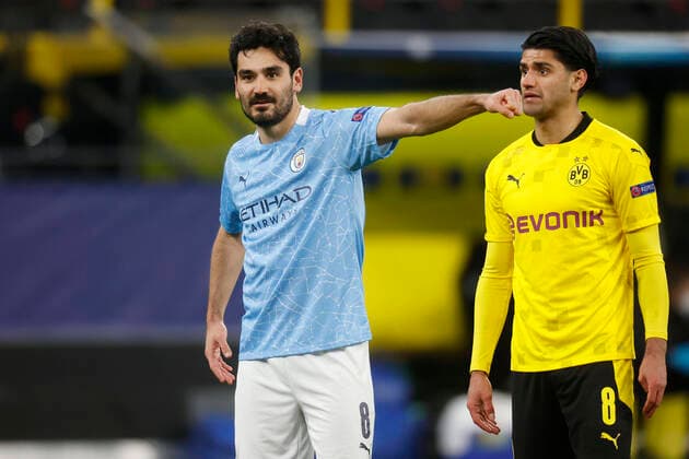 Dortmund, Germany, UEFA Champions League, quarter-final Borussia Dortmund Manchester City FC 1 2 on 14 04 2021 at Signal Iduna Park in Dortmund Ilka GÜNDOGAN MCFC left and Mahmoud DAHOUD BVB right In accordance with UEFA regulations, it is forbidden to use or have used photographs taken in the stadium or of the match in the form of sequence pictures or video-like photo series.