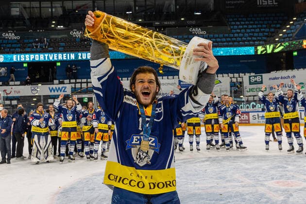 Yannick Zehnder 12 EV Zug with the cup during the National League Playoff Final hockey match 3 between the EV Zug and the Genève Servette HC on 07 05 2021 at the Bossard Arena in Zug  Copyright: xJustPictures.ch PhilippxHegglinx