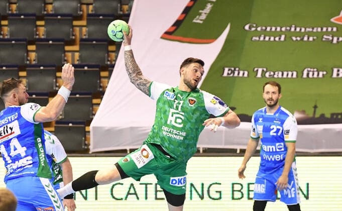 Handball, Men, Season 2020 2021, 1 Bundesliga 15 Matchday , Füchse Berlin FRISCH AUF Göppingen, v l Jacob Bagersted FRISCH AUF Göppingen , Johan Koch Füchse Berlin , Marco Rentschler FRISCH AUF Göppingen , 16 05 2021, Copyright: xSebastianxRäppoldx xMatthiasxKox