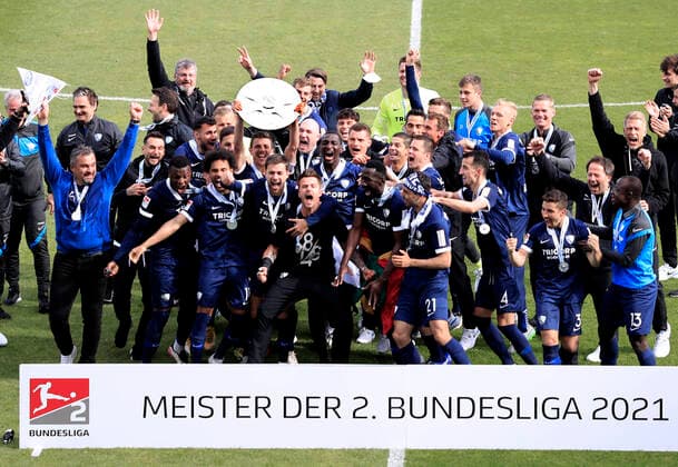 LOSILLA Anthony Kapitaen Team VfL Bochum celebrates after the victory of his team and the German championship of the 2 football Bundesliga 2021 at the award ceremony with the championship trophy 2 Bundesliga season 2020 2021 match VfL Bochum SV Sandhausen 3 1 on 23 May 2021 in Bochum DFL REGULATIONS PROHIBIT ANY USE OF PHOTOGRAPHS as IMAGE SEQUENCES and or QUASI VIDEO