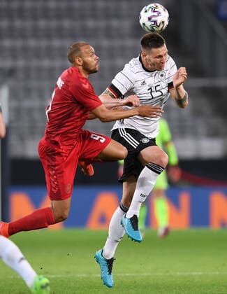 FUSSBALL INTERNATIONAL Test match EM 2021 in Innsbruck Germany Denmark 02 06 2021 Martin Braithwaite left, Denmark against Niklas Suele right, Germany