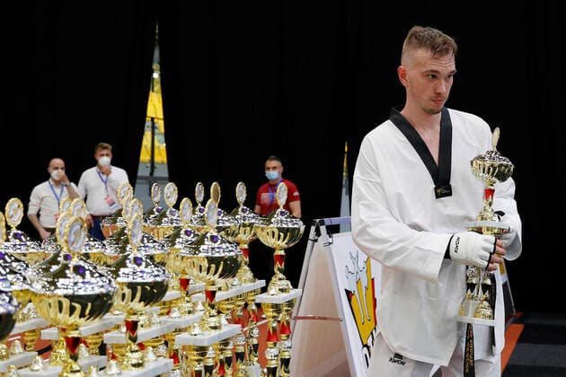 Dortmund, Germany, The Finals 2021, German Taekwondo Championships, on 04 06 2021 in the Helmut Körnig Hall in Dortmund Final 80 kg Alexander BACHMANN with his winners trophy after winning the title