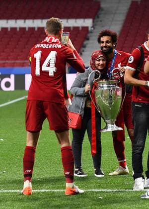 Mandatory Credit: Photo by BPI Shutterstock (10266556np) Jordan Henderson takes a photo of Mohamed Salah of Liverpool with his wife Magi Tottenham Hotspur v Liverpool, UEFA Champions League Final, Football, Wanda Metropolitano Stadium, Madrid, Spain - 01 Jun 2019 Editorial use only Tottenham Hotspur v Liverpool, UEFA Champions League Final, Football, Wanda Metropolitano Stadium, Madrid, Spain - 01 Jun 2019 Editorial use only Copyright: xBPI Shutterstockx 10266556np