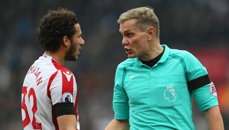 Mandatory Credit: Photo by Michael Zemanek BPI Shutterstock (9569606cv) Referee Graham Scott instructs Ramadan Sobhi of Stoke City Stoke City v Tottenham Hotspur , Premier League , bet365 Stadium, Stoke-on-Trent , UK - 7 Apr 2018 EDITORIAL USE ONLY No use with unauthorised audio, video, data, fixture lists (outside the EU), club league logos or live services. Online in-match use limited to 45 images (+15 in extra time). No use to emulate moving images. No use in betting, games or single club league player publications services. Stoke City v Tottenham Hotspur , Premier League , bet365 Stadium, Stoke-on-Trent , UK - 7 Apr 2018 EDITORIAL USE ONLY No use with unauthorised audio, video, data, fixture lists (outside the EU), club league logos or live services. Online in-match use limited to 45 images (+15 in extra time). No use to emulate moving images. No use in betting, games or Copyright: xMichaelxZemanek BPI Shutterstockx 9569606cv
