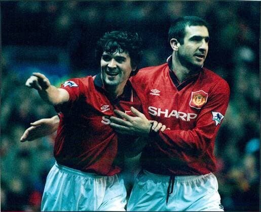 Mandatory Credit: Photo by Jim Hutchison ANL Shutterstock (1334771a) Football 1995 96: Premier League - Manchester United, ManU 2 V Everton 0. Man Utd s Royal Keane And Eric Cantona. Football 1995 96: Premier League - Manchester United 2 V Everton 0. Man Utd s Royal Keane And Eric Cantona. EDITORIAL USE ONLY No use with unauthorised audio, video, data, fixture lists (outside the EU), club league logos or live services. Online in-match use limited to 45 images (+15 in extra time). No use to emulate moving images. No use in betting, games or single club league player publications services. Football 1995 96: Premier League - Manchester United 2 V Everton 0. Man Utd s Royal Keane And Eric Cantona. EDITORIAL USE ONLY No use with unauthorised audio, video, data, fixture lists (outside the EU), club league logos or live services. Online in-match use limited to 45 images (+15 in extra time). No use to emulate moving images. No use in betting, games or  Copyright: xJimxHutchison ANL Shutterstockx 1334771a