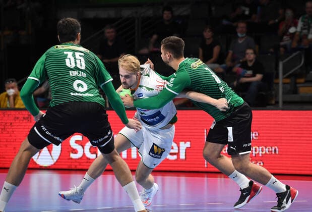 Handball, men, 2021 2022 season, 1 Bundesliga 1 matchday , Füchse Berlin HSG Wetzlar, v l Marko Kopljar Füchse Berlin , Magnus Fredriksen HSG Wetzlar , Fabian Wiede Füchse Berlin , 09 09 2021, Copyright: xSebastianxRäppold MatthiasxKochx