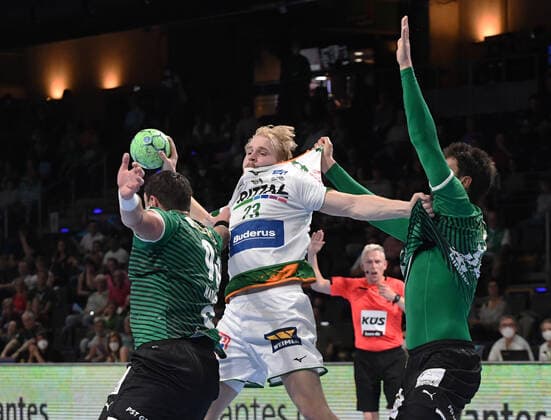Handball, men, 2021 2022 season, 1 Bundesliga 1 matchday , Füchse Berlin HSG Wetzlar, v l Mijajlo Marsenic Füchse Berlin , Magnus Fredriksen HSG Wetzlar , Marko Kopljar Füchse Berlin , 09 09 2021, Copyright: xSebastianxRäppold MatthiasxKochx