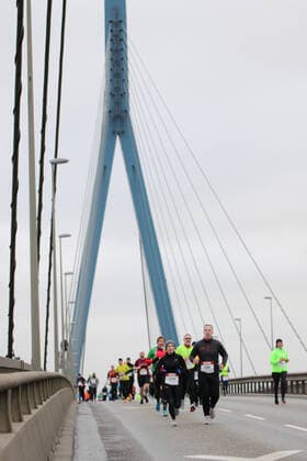 Participants at the Köhlbrand bridge run in the port of Hamburg