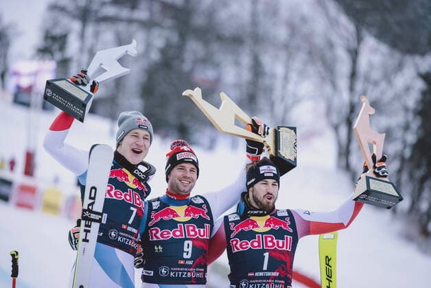 23 01 2022, Streif, Kitzbühel, AUT, FIS Alpine Ski World Cup, Downhill, Men, Award Ceremony, in picture 2 place Marco Odermatt SUI , winner Beat Feuz SUI , 3 place Daniel Hemetsberger AUT 2nd Marco Odermatt of Switzerland Winner Beat Feuz of Switzerland 3rd placed Daniel Hemetsberger of Austria during the winner ceremony for the men s Downhill Race of FIS Ski Alpine World Cup at the Streif in Kitzbühel, Austria on 2022 01 23 Expa Kitzbühel EP_fei