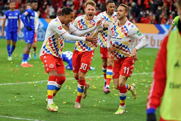 Mainz, Germany 18 February 2022 1 BL 2021 2022 FSV Mainz 05 vs Bayer 04 Leverkusen Goal scorer Marcus Ingvartsen Mainz 1 v re happy about his winning goal to 3 2 DFL regulations prohibit any use of photographs as image sequences tand or quasi video Mewa Arena Rheinland Pfalz Copyright: xFotostandx xRacochax