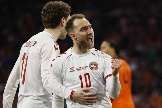 AMSTERDAM lr Andreas Skov Olsen of Denmark, Christian Eriksen of Denmark celebrates 3 2 during the friendly match between the Netherlands and Denmark at the Johan Cruijff ArenA on March 26, 2022 in Amsterdam, Netherlands ANP MAURICE VAN STEEN International Friendly 2021 2022 xVIxANPxSportx xxANPxIVx 446139147 originalFilename: 446139147.jpg