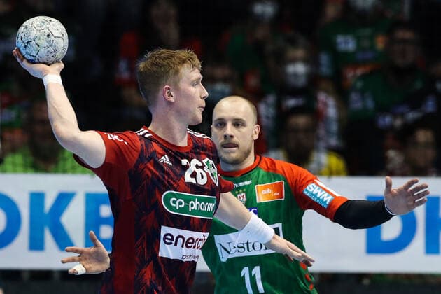 Jonathan Edvardsson TSV Hannover Burgdorf,26 vs Daniel Pettersson SC Magdeburg,11 Handball Bundesliga season 2021 2022 SC Magdeburg vs TSV Hannover Burgdorf at GETEC Arena in Magdeburg Action,man,men,handball,Germany,31 03 2022