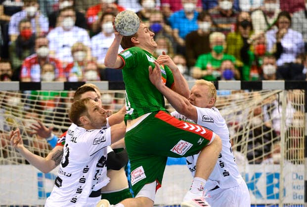 Gisli Kristjansson SC Magdeburg, 10 vs Hendrik Pekeler THW Kiel, 61 , Steffen Weinhold THW Kiel, 13 and Patrick Wiencek THW Kiel, 17 , Handball, Men, THW Kiel vs SC Magdeburg, REWE Final4, Final, DHB Pokal, Season 2021 2022, 24 04 22 Hamburg Barclays Arena Hamburg Germany