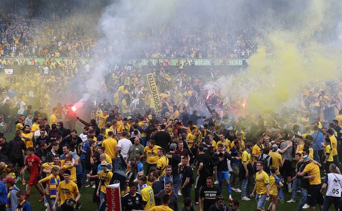 Platzsturm after the promotion of Eintracht Braunschweig to the 2 Liga DFL REGULATIONS PROHIBIT ANY USE OF PHOTOGRAPHS AS IMAGE SEQUENCES AND OR QUASI VIDEO