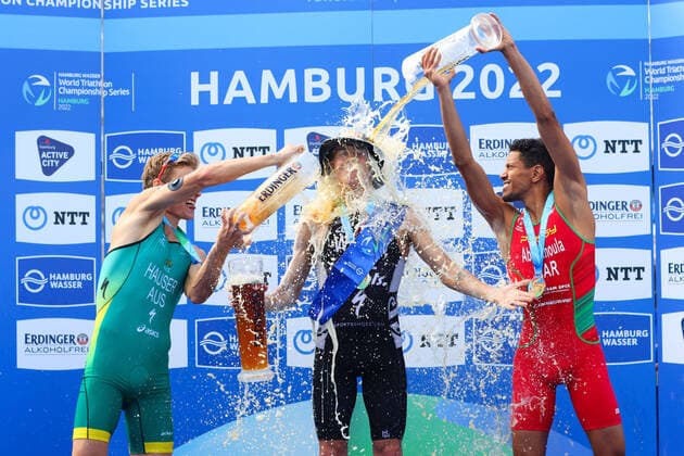 Triathlon I Men I Hamburg Water World Triathlon Championship Series I 09 07 2022 Award Ceremony and Beer Shower MatthewHauser, Australia Hayden Wilde, New Zealand Jawad Abdelmoula, Morocco Copyright: xLobeca RalfxHomburgx