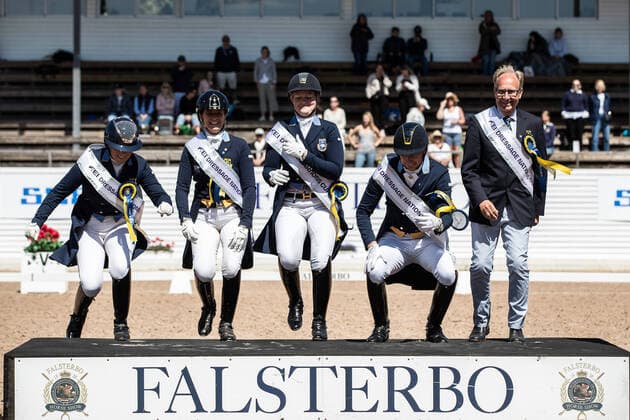 220717 Team Sweden cheers for the total win in the nations cup during day 9 of Falsterbo Horse Show on July 17, 2022 in Falsterbo,  Copyright: MATHILDAxAHLBERG BB220717BB547