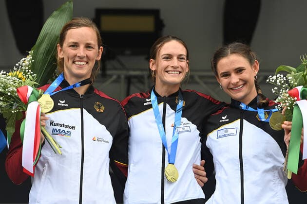 from left Jasmin SCHORNBERG GER ,Ricarda FUNK GER , Elena LILIK GER ,Award ceremony with medals,Gold,Place 1,Winner,Champion Jubel,Freude,Begeisterung, Women s Canoe Team Final Men s Kayak Team Final 2022 ICF Canoe Slalom World Championships on 27 07 2022 in Augsburg