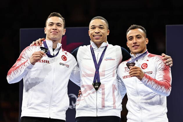 Winners Ahmet Onder TUR, Joe Fraser GBR, Aden Asil TUR after all around final at 2022 seniors Europeans in Munich 18 08 2022