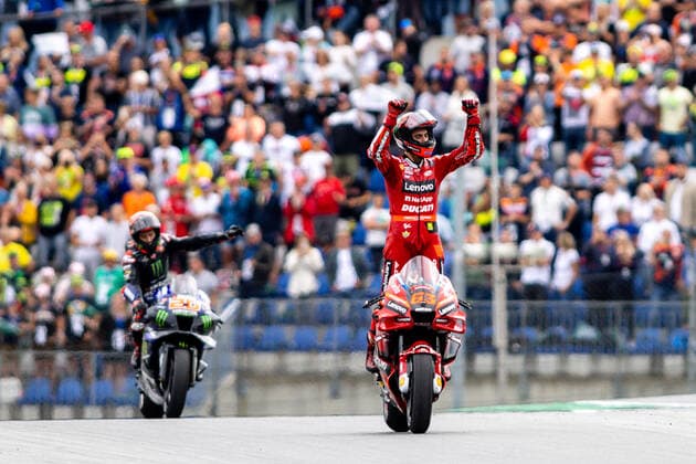 MOTORSPORTS - MotoGP, GP of Austria 2022 SPIELBERG,AUSTRIA,21.AUG.22 - MOTORSPORTS - MotoGP, Grand Prix of Austria, Red Bull Ring. Image shows Fabio Quartararo (FRA Monster Energy Yamaha MotoGP) and the rejoicing of Francesco Bagnaia (ITA Ducati Team).  GEPAxpictures xMaticxKlansek